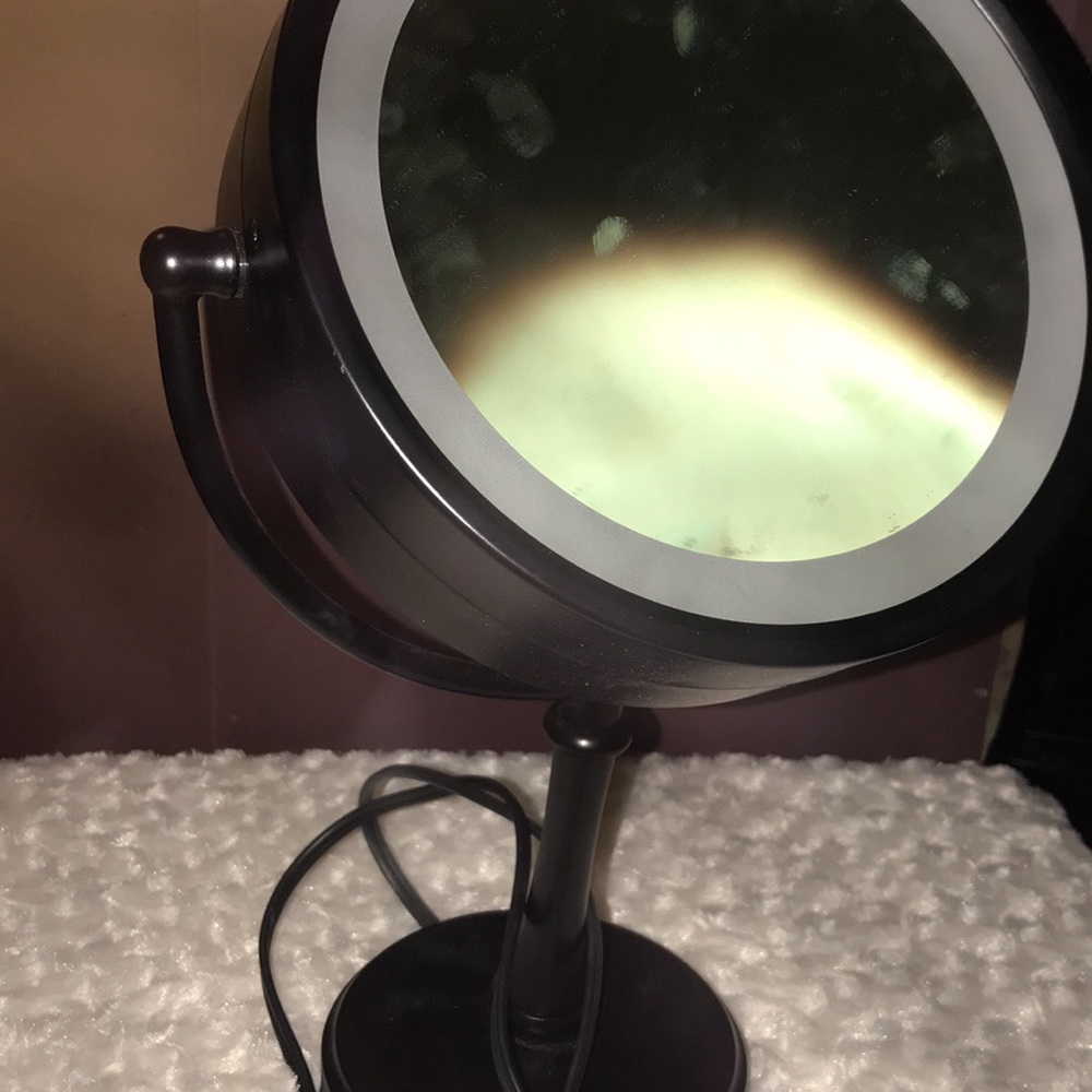 Mirror with lighting